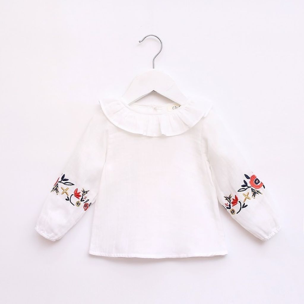 Conjunto bebé niña blusa bordada, short borlitas